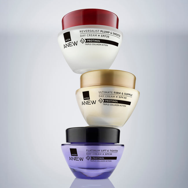 Three Anew skincare day cream jars stacked vertically on a light gray gradient background. 