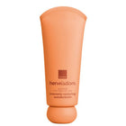 A squeeze tube of Avon Her Wisdom Baobab The Tree of Life Intensely Restoring Wonderbalm in a matte peach-orange color, shown against a plain white background.